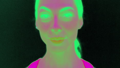 tempting woman looking left and blinking her eyes in ir infrared camera slow motion