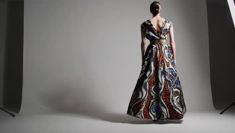 woman in a printed maxi dress
