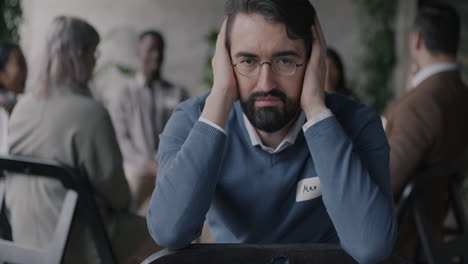 Man in Group Therapy Session