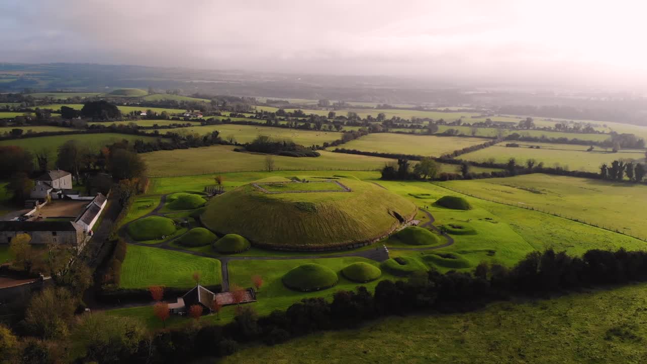 Knowth, Neolithic passage grave aerial orbit shot. Ancient monument located in Ireland. World Heritage site.