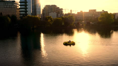 aerial drone shot over cluj-napoca city, iulius mall zone, iulius park , lake view