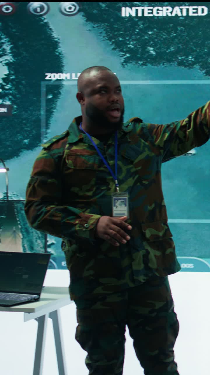 Vertical Video Military personnel operate advanced systems in a command center
