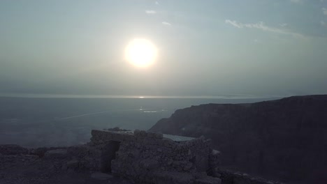 morning sun in israel desert, remains of masada fortress