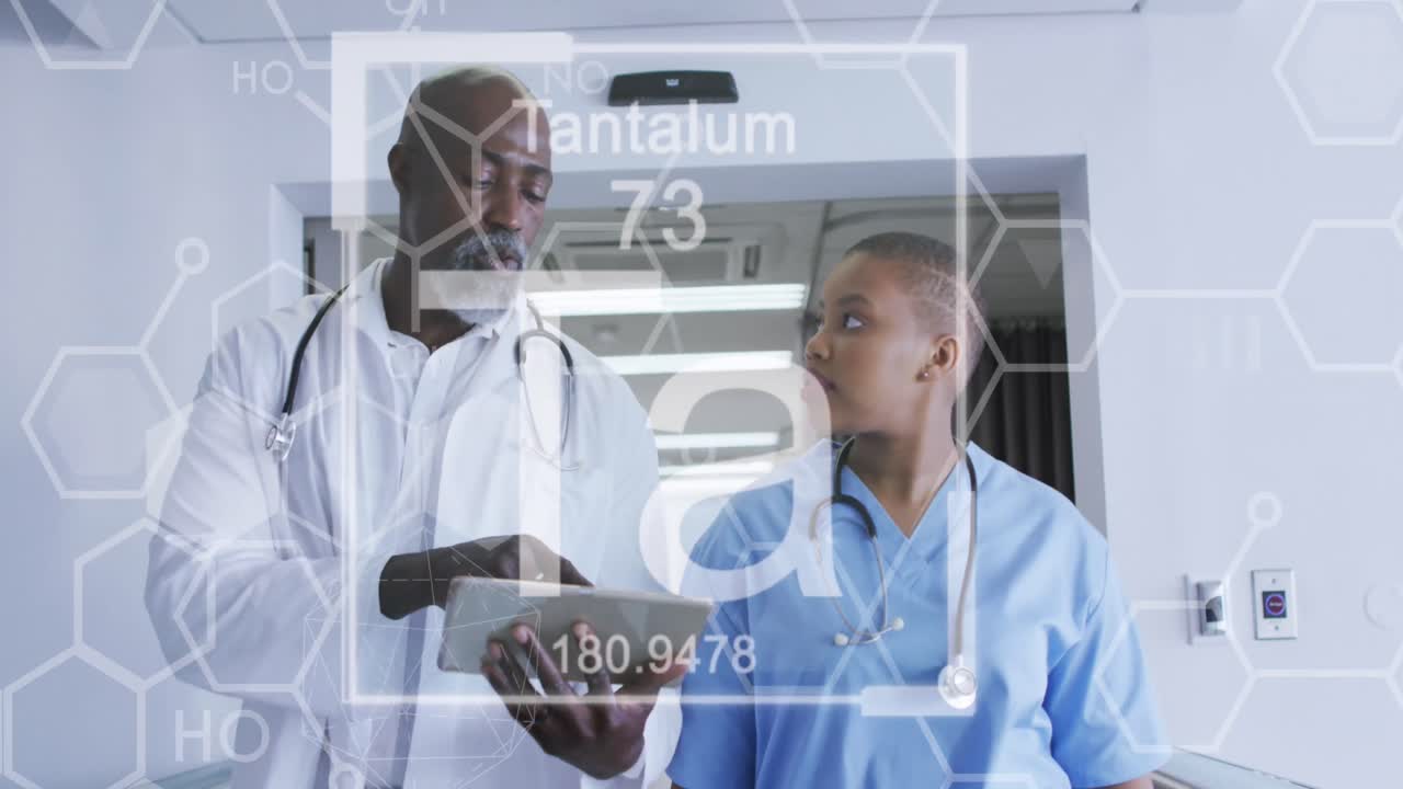 Animation of chemical symbols over african american male and female doctors