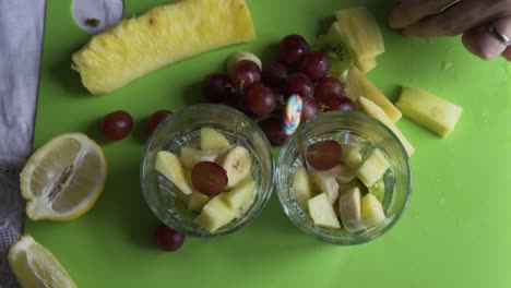 someone making a healthy colourful breakfast at home, top down