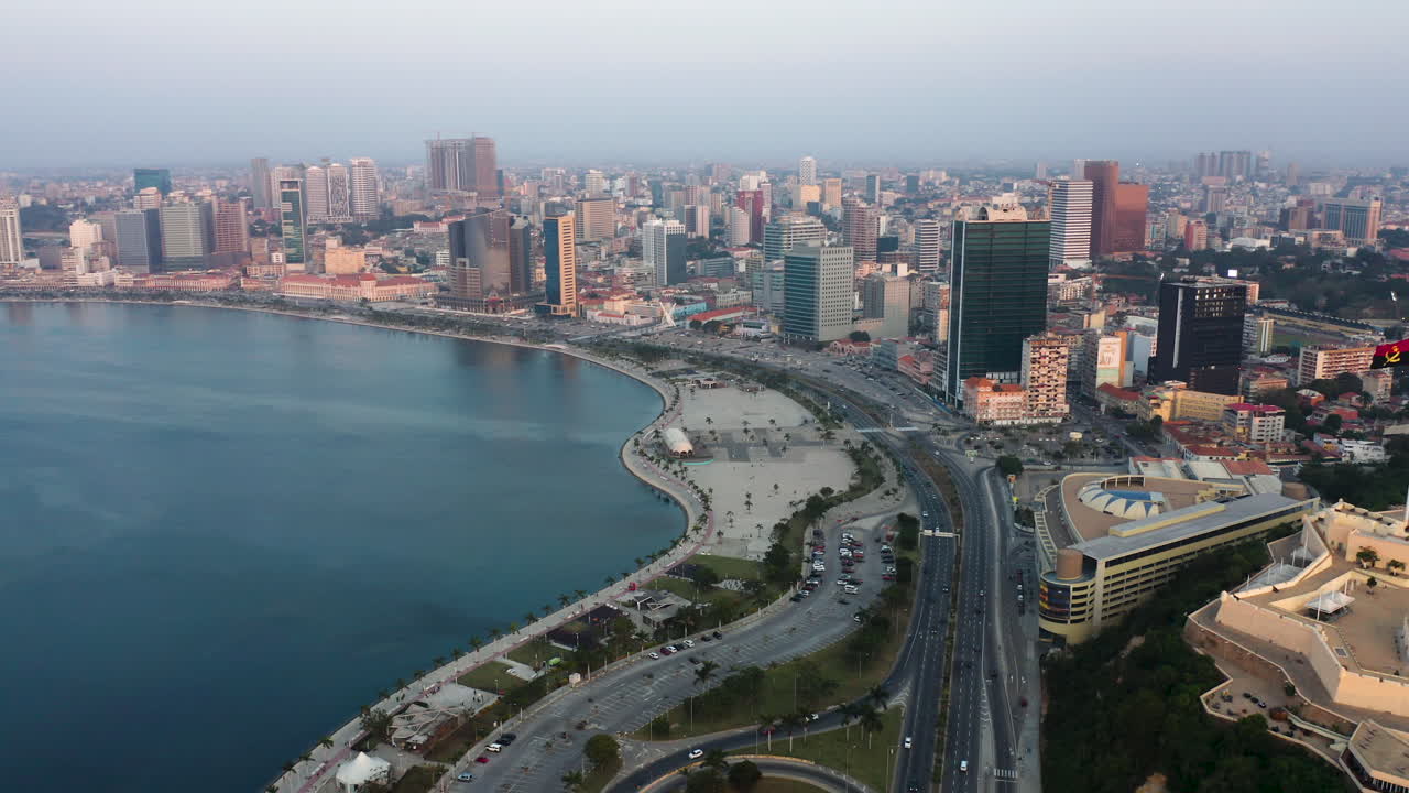 Traveling front, Luanda city, golden hour flying over Luanda bay, Africa #2