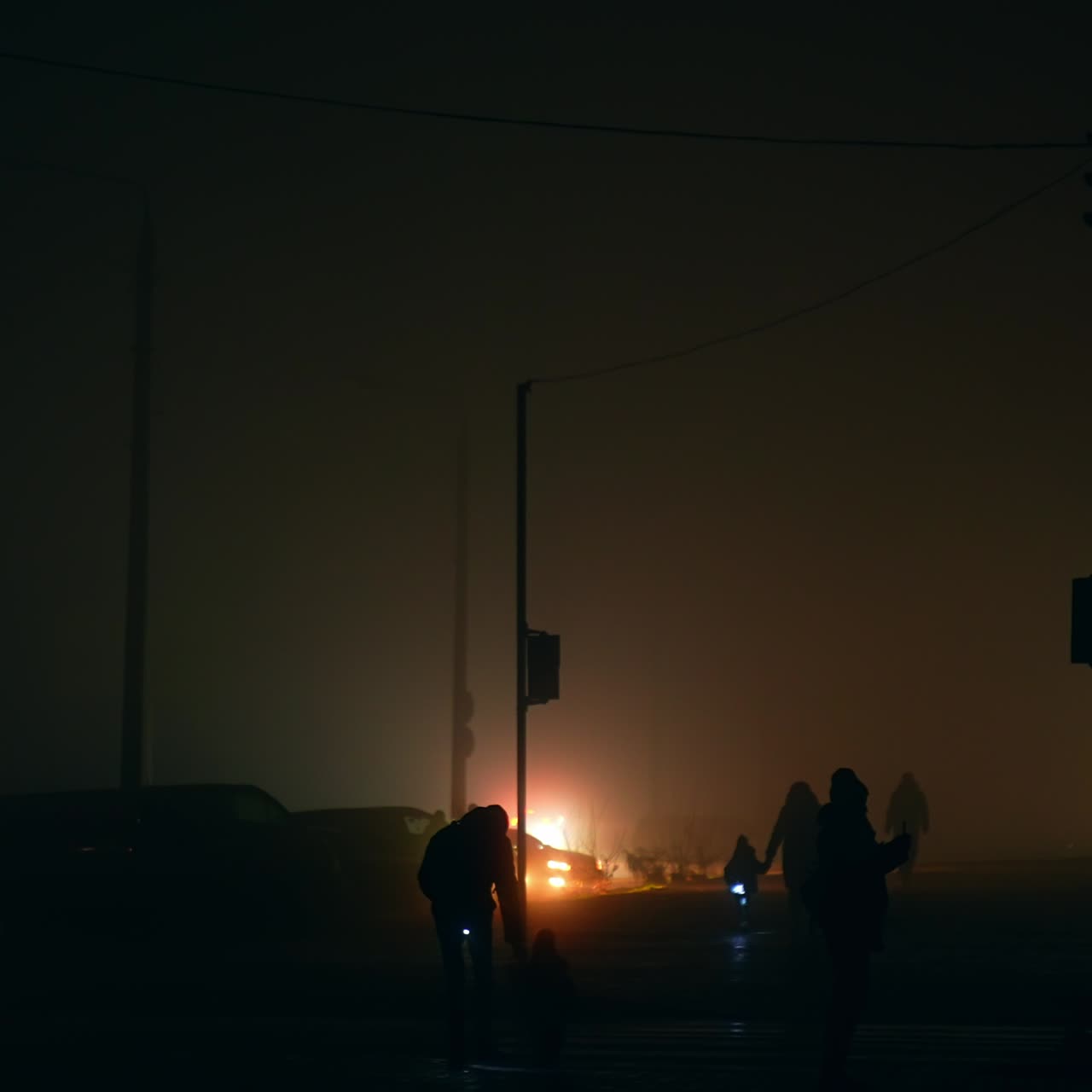 People of Ukrainian cities walking with flashlights at night time as there's no power. Darkness covering Ukraine after russian attacks on energy system