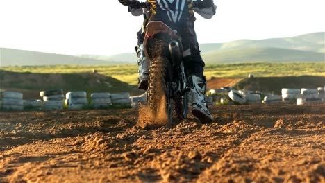 man riding a motor cross bike