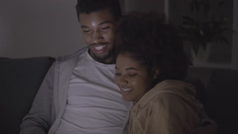 Young-Couple-Choosing-A-Movie-To-Watch-On-The-Laptop-1