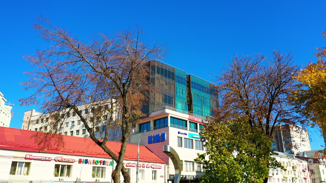 Sight of the beautiful city centre at daytime. Autumn sunny day in the downtown. Top perspective.