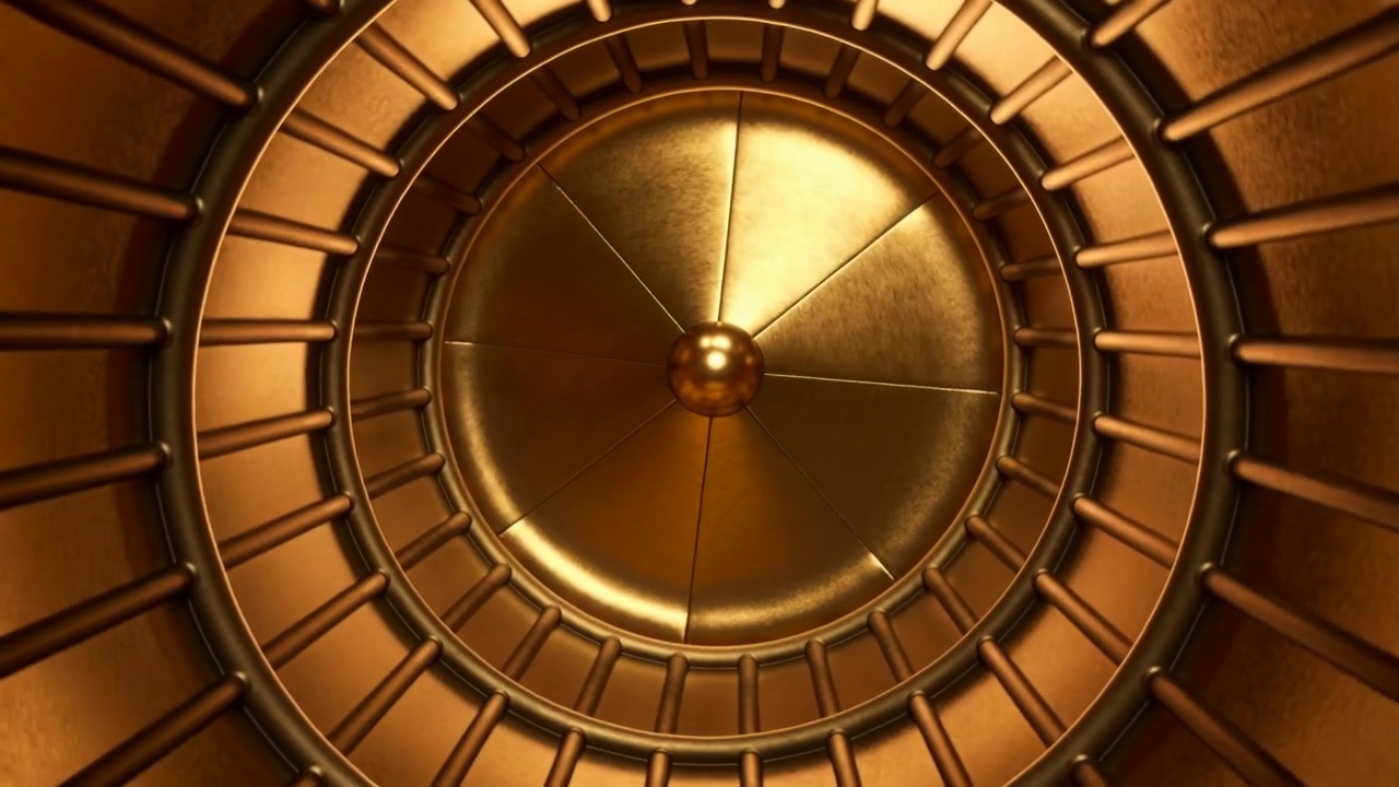 Motore in funzione, disco centrale segmentato che ruota lentamente in senso orario nell'alloggiamento con mozzo e nervature.
