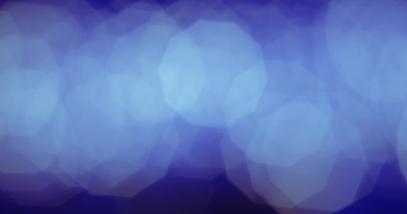Abstrakt sløret sekskantet blå bokeh