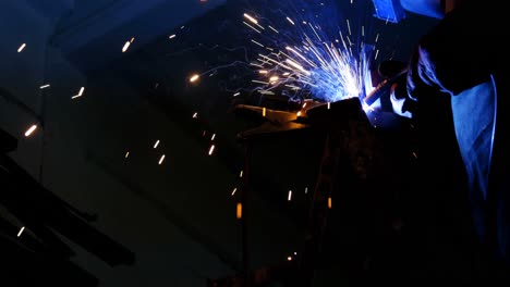 welder welding a metal