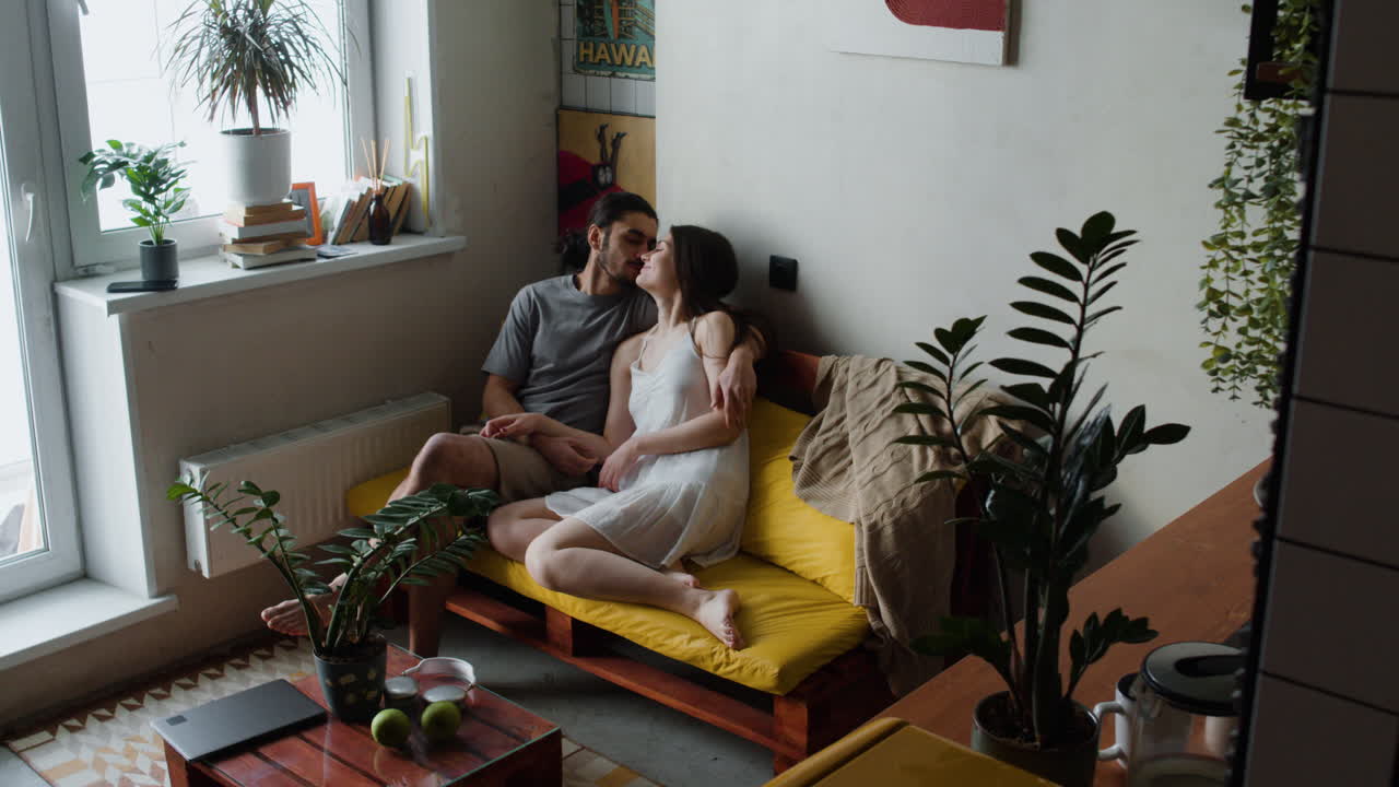 Couple in love on the sofa