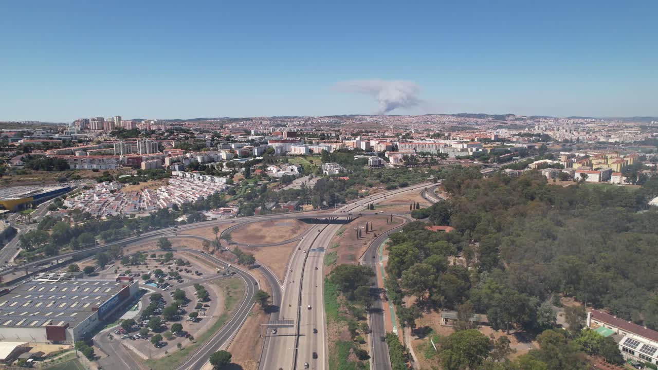 Drone view of the Lisbon City Fire event from a distance, visible clouds of smoke