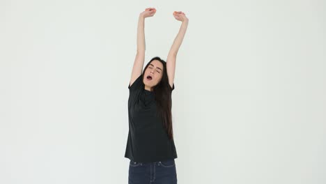 Woman stretching and yawning