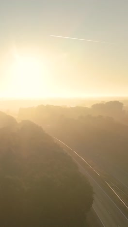 misty sunrise over hills