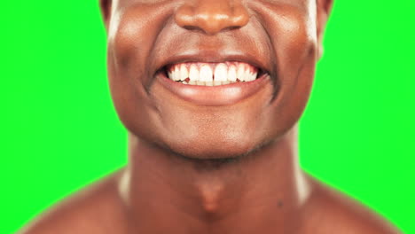 Black-man,-teeth-and-smile-with-dental-on-green