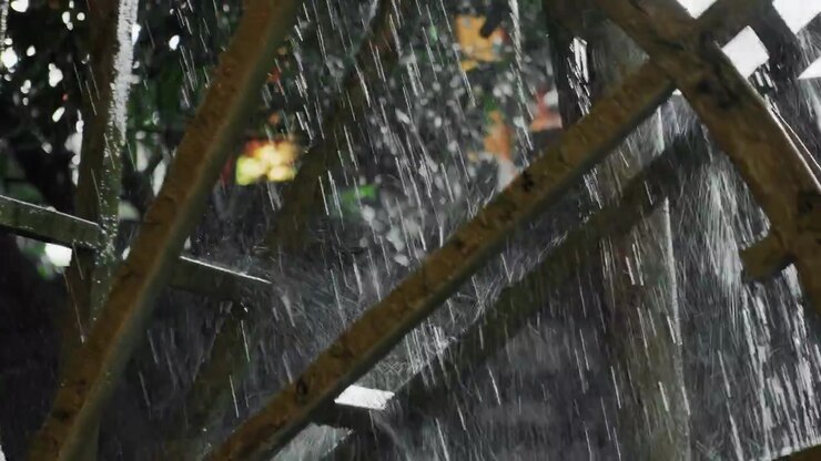 Night rain soaked water wheel with heavy splashes and rapid rotation, torrents and spray hitting timber blades, dark soaked spokes and high contrast lighting, dramatic gritty mood