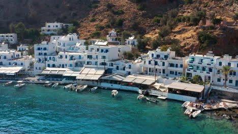 beautiful grecian villas in loutro village on the island of crete - aerial shot