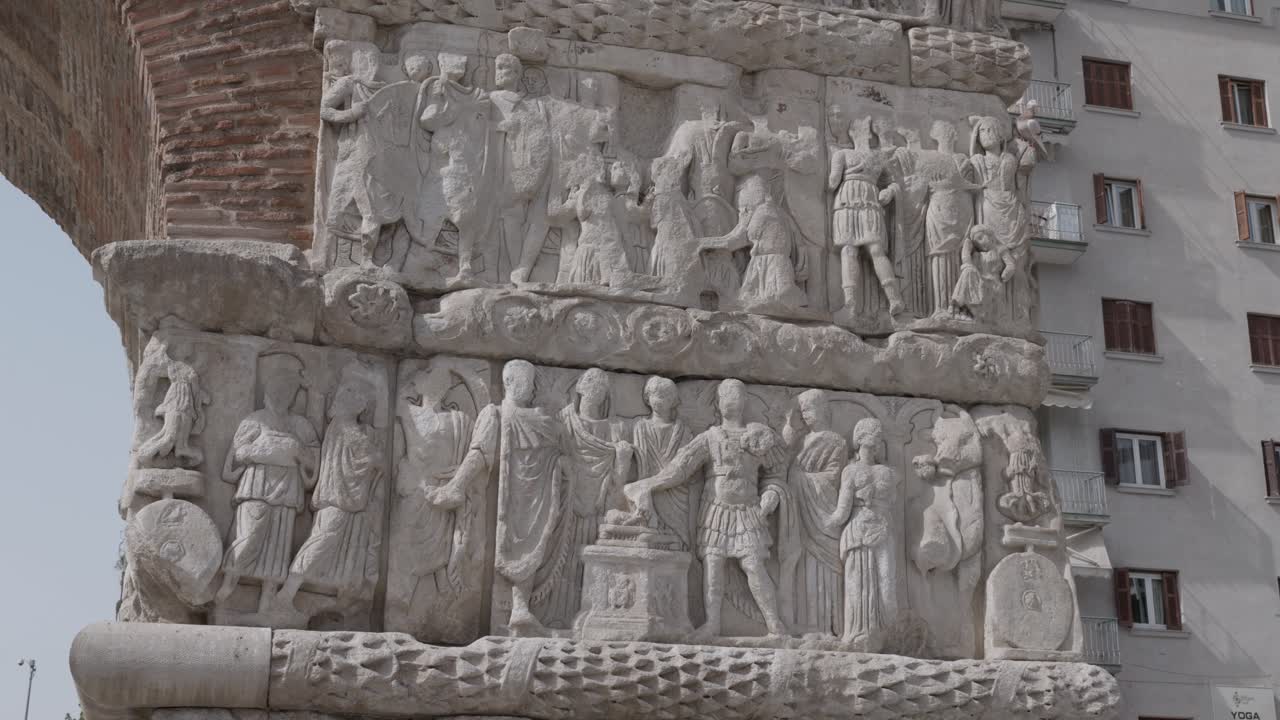 Close establishing of carved reliefs on Arch of Galerius in Thessaloniki, Greece, historic detail