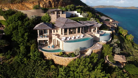 aerial view of luxury villas with swimming pools