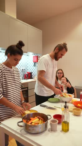 family preparing a meal together