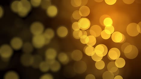 abstractas luces doradas brillantes, chispas y fuegos artificiales como partículas, bokeh, fondo de luz.