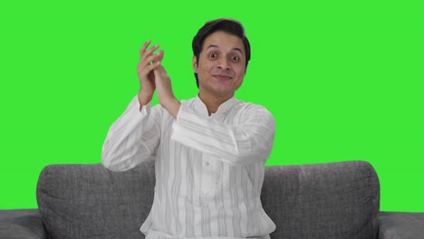 Happy-Indian-man-clapping-and-appreciating-Green-screen