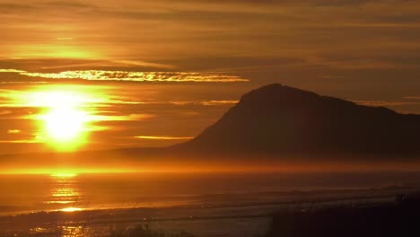 Sunrise-over-headland,-Denia-Spain