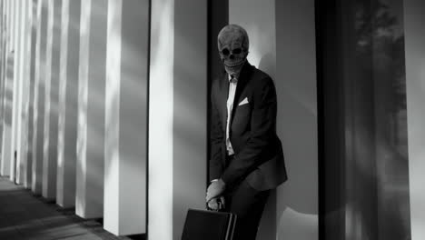 businessman in skull mask
