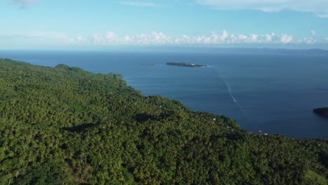 Flying-off-Monte-Rojo-mountain-on-the-Samaná-peninsula-in-the-Dominican-Republic-towards-popular-Cayo-Levantado-island