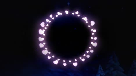 pink glowing decorative heart shaped fairy lights against shining blue stars in night sky