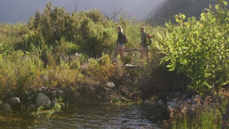 caucasian couple hiking in nature