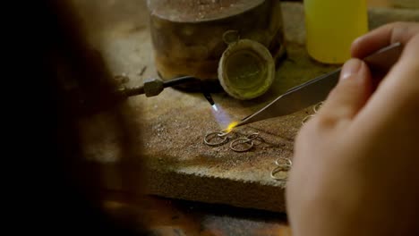 jewelry designer working in workshop 4k