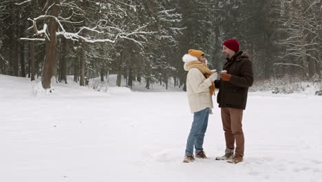 Couple enjoying a winter day in the snow