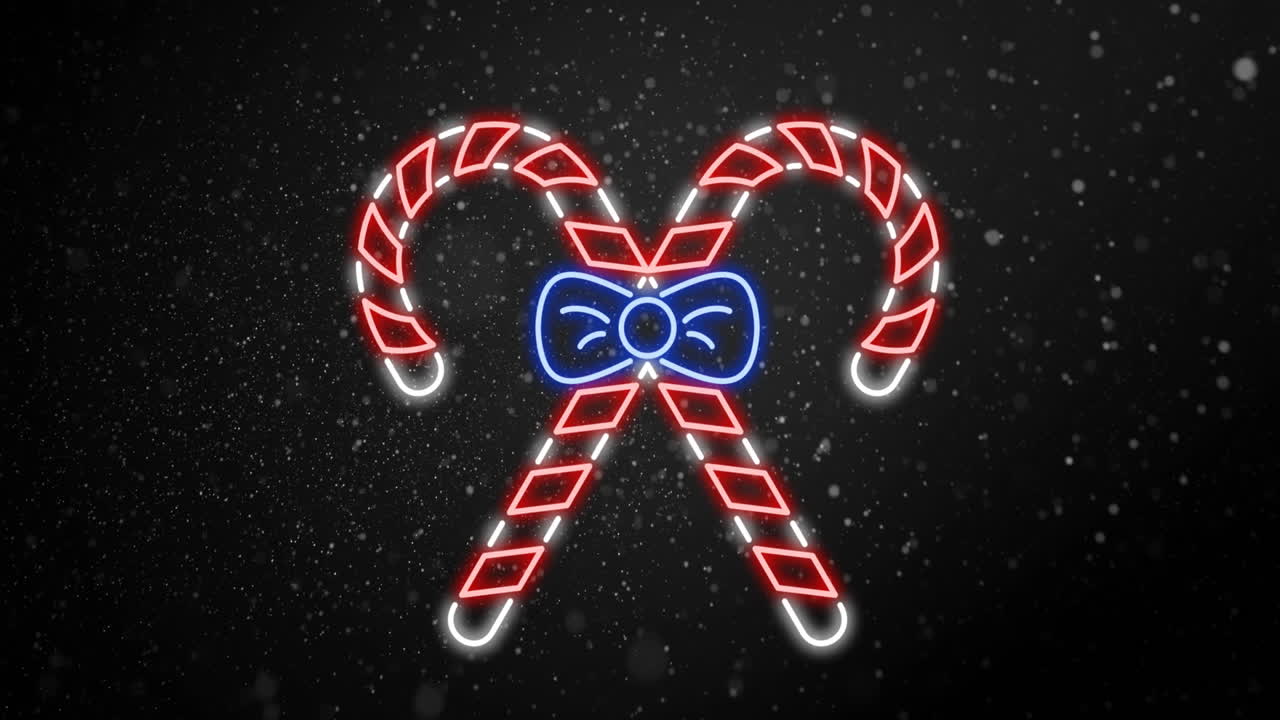 Animation of snow falling over christmas candy canes