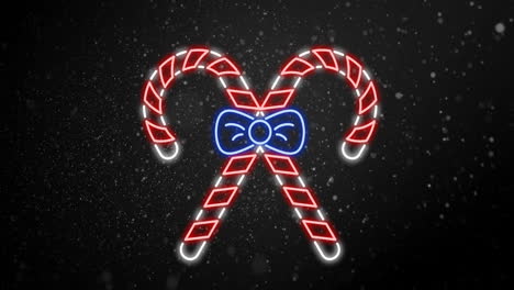 animation of snow falling over christmas candy canes