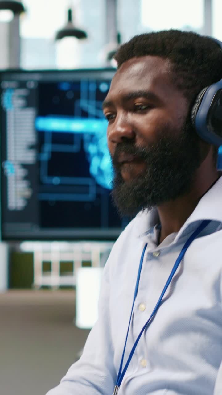 Vertical video Technician using PC to code, testing applications to minimize bugs