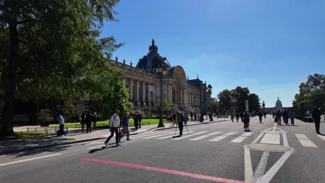 crowded street in front of grand palais, paris