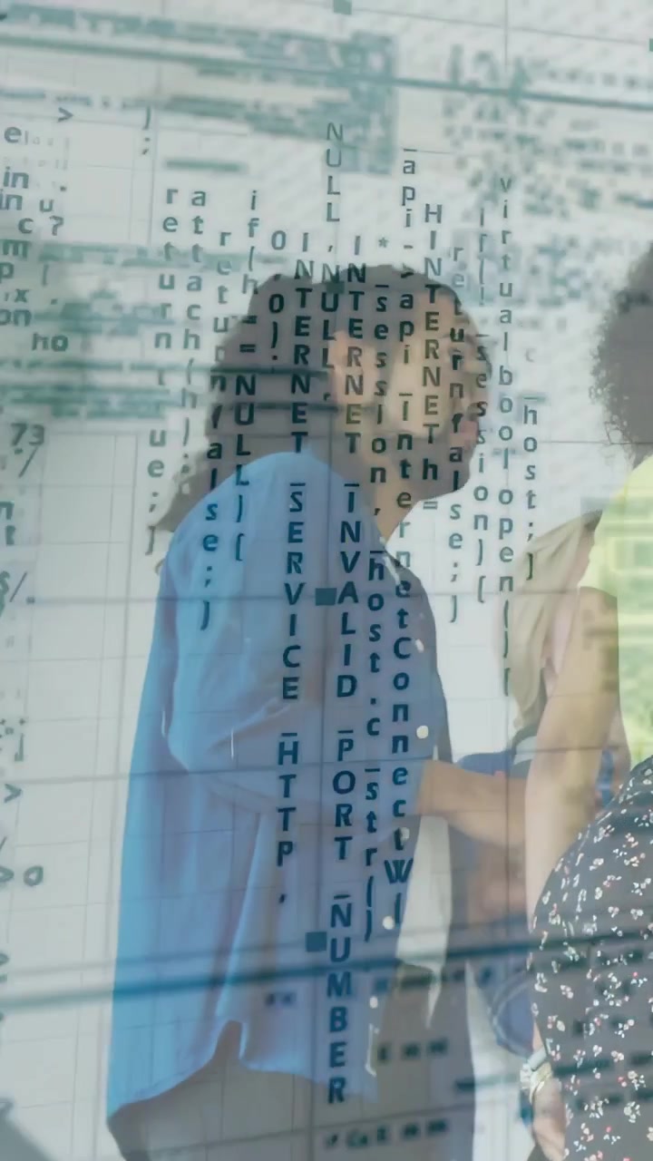 Vertical video: Woman walking, discussing code, man turning and gesturing as code overlaying glass