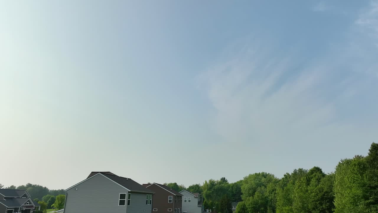 Drone turning toward a blue Summer Sky