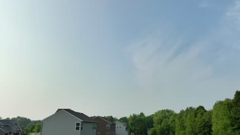 drone turning toward a blue summer sky