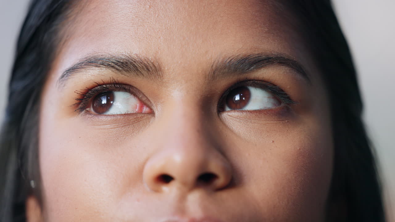Closeup of a DIY electrician with brown eyes