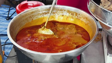 delicious spicy curry being prepared