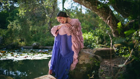 fairytale girl posing beautiful nature lake landscape. charming woman nymph