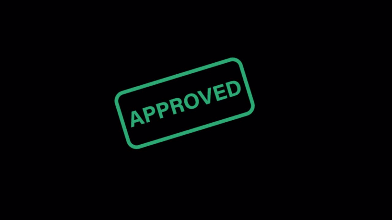Green Approved Stamp Animation on Black Background