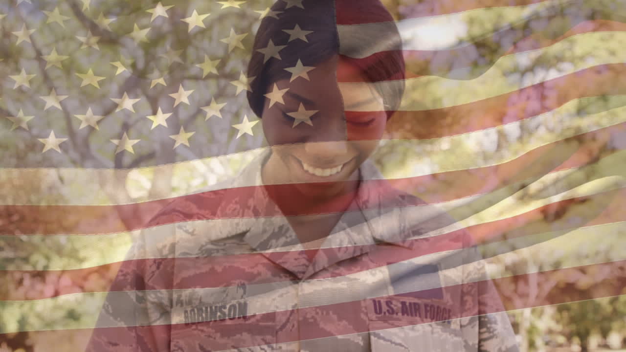 soldado estadounidense sosteniendo a sus hijas