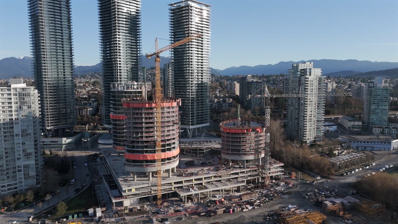 Burnaby, British Columbia, Canada - High-rise Towers and Ongoing Construction Shape the Skyline - Orbit Drone Shot