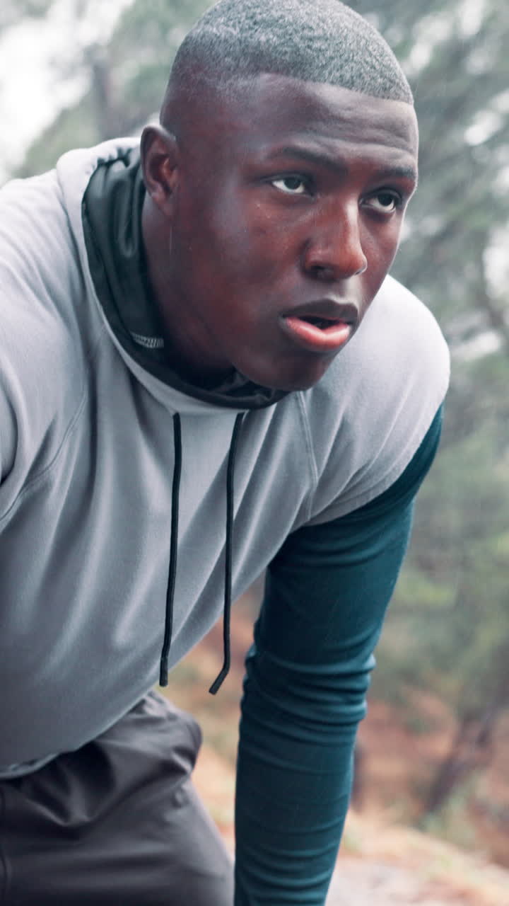 Determined Young Man Catching Breath During Outdoor Workout